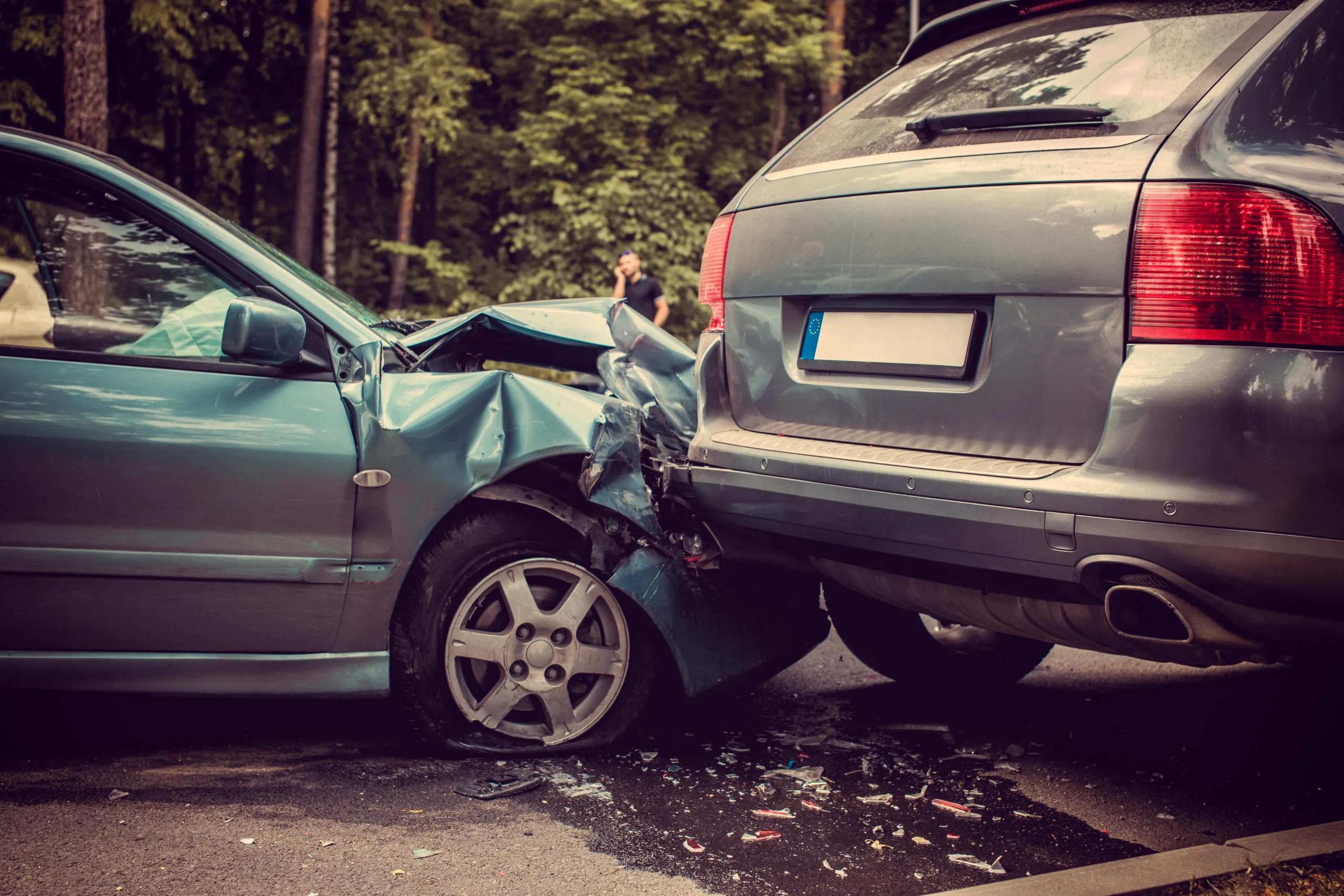 Two cars after a collision with drivers exchanging information